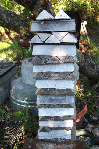 a stack of 3lb ingots poured from cleanoing up about 300lbs of wheel weight lead weights.