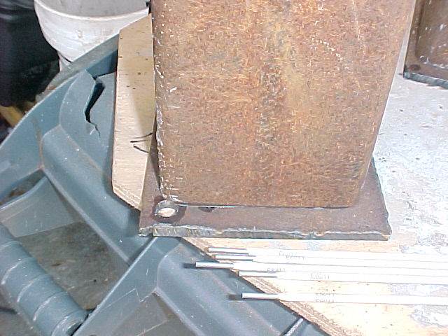 the 1/4" steel base is lined up with the 5" steel tube leaving a small point for a pickup hole